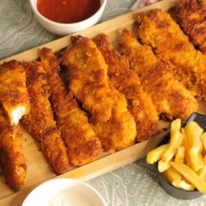 Kako napraviti domaće pileće trake u rerni: hrskava korica bez dubokog prženja