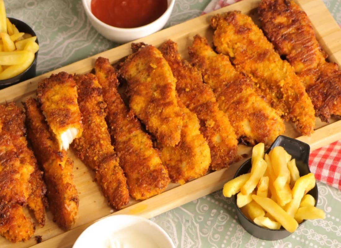 Kako napraviti domaće pileće trake u rerni: hrskava korica bez dubokog prženja